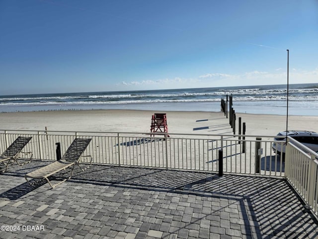 219 S Atlantic Ave Unit 235, Daytona Beach, FL 32118 - deck featuring view of water and beach