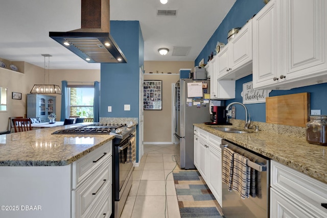 kitchen with light tile patterned floors, stainless steel appliances, a sink, visible vents, and wall chimney exhaust hood