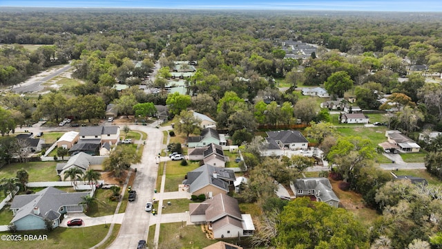 aerial view featuring a residential view and a forest view