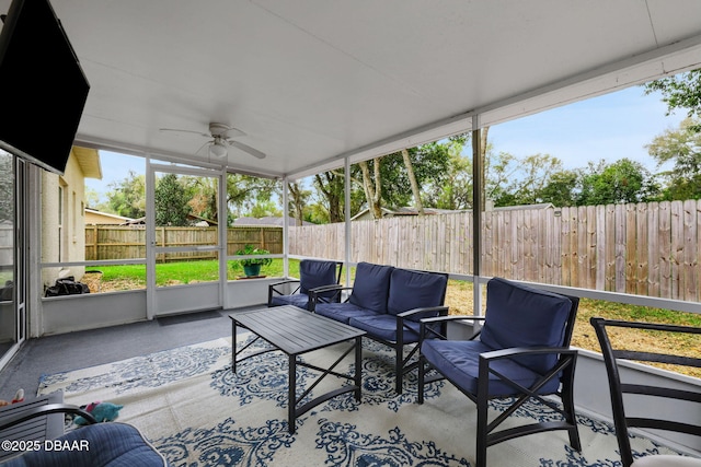 sunroom / solarium with ceiling fan