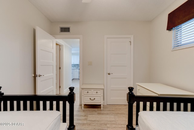 1133 Ocean Shore Blvd Unit 905, Ormond Beach, FL 32176 - bedroom with light wood-style floors