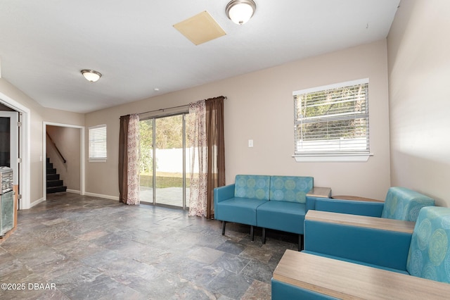 living room featuring plenty of natural light