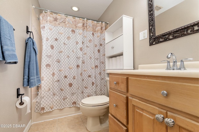 full bathroom with vanity, toilet, shower / bath combo with shower curtain, and tile patterned flooring