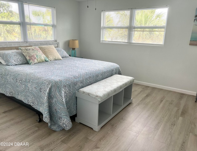 bedroom featuring light wood-type flooring