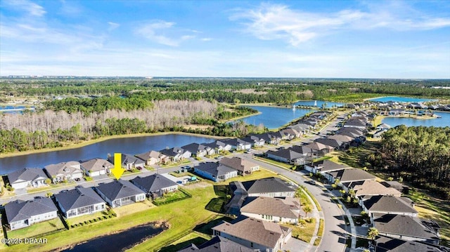 bird's eye view with a residential view and a water view