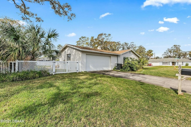 ranch-style house featuring a garage and a front yard