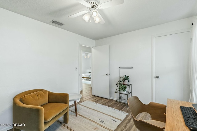 office area featuring ceiling fan and light hardwood / wood-style flooring