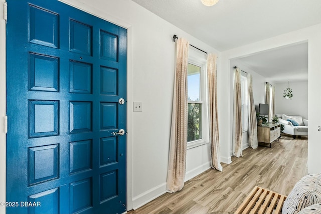 entrance foyer featuring light hardwood / wood-style floors