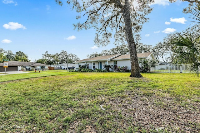 view of yard featuring fence