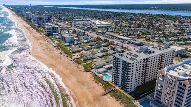 aerial view featuring a view of the beach and a water view