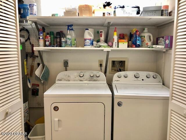 laundry area with washing machine and clothes dryer