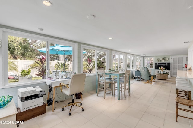 sunroom / solarium with a healthy amount of sunlight