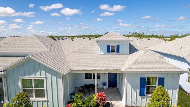 view of front of house with a patio area