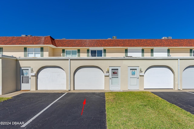 view of property featuring a garage