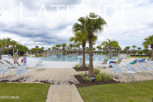 view of pool featuring a patio