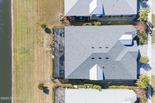 bird's eye view with a water view