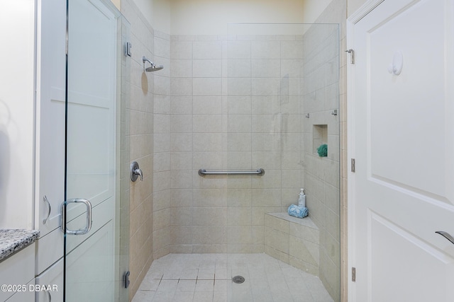 bathroom featuring an enclosed shower