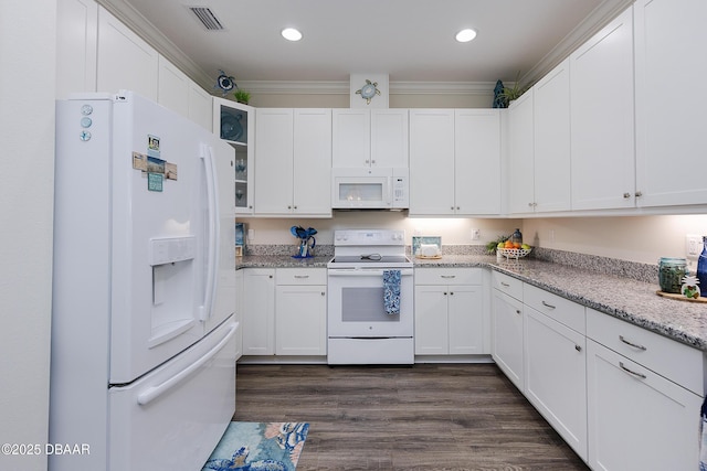 kitchen featuring light stone countertops, white appliances, white cabinets, and dark hardwood / wood-style floors