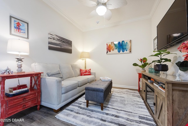 living room featuring ceiling fan, dark wood-type flooring, and ornamental molding