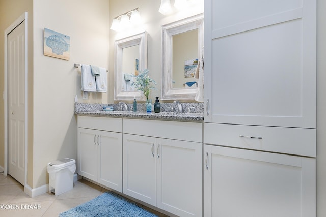 bathroom featuring vanity and tile patterned floors