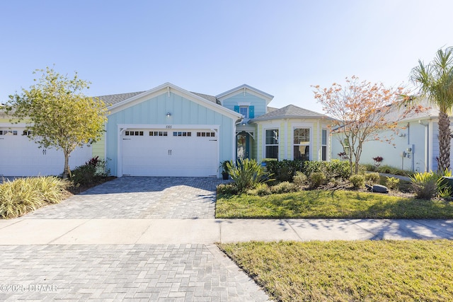 view of front of property with a garage