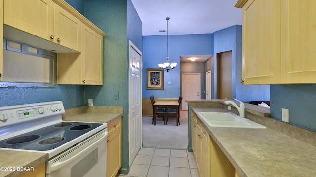 830 Airport Rd Unit 115, Port Orange, FL 32128 - kitchen with white range with electric cooktop, a sink, light brown cabinets, a chandelier, and a textured wall