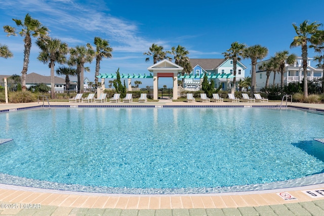 community pool featuring a patio area
