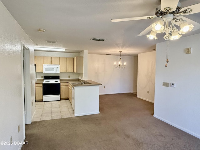 kitchen with range with electric stovetop, light colored carpet, light brown cabinetry, white microwave, and a sink