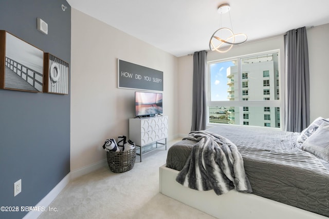 241 Riverside Dr Unit 2301, Holly Hill, FL 32117 - carpeted bedroom featuring baseboards