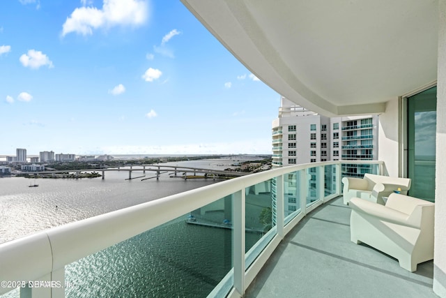 241 Riverside Dr Unit 2301, Holly Hill, FL 32117 - balcony with a water view and a city view