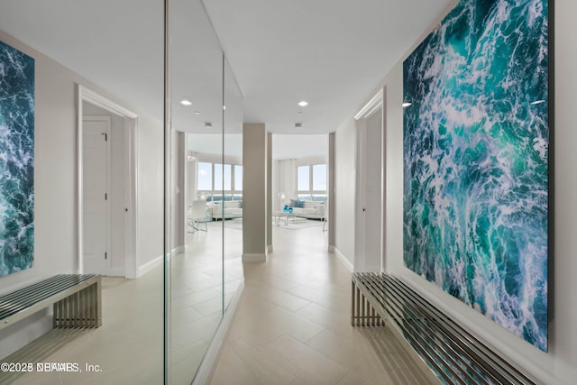 241 Riverside Dr Unit 2301, Holly Hill, FL 32117 - corridor with light tile patterned floors, recessed lighting, and baseboards