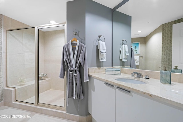 241 Riverside Dr Unit 2301, Holly Hill, FL 32117 - bathroom with recessed lighting, a shower stall, and vanity