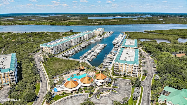 birds eye view of property featuring a water view