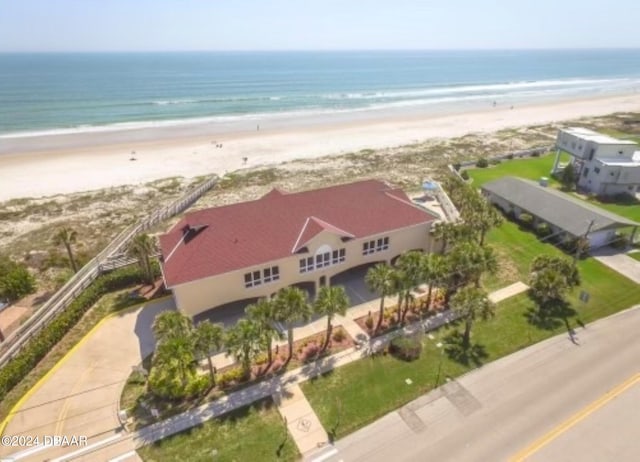 aerial view featuring a water view and a beach view