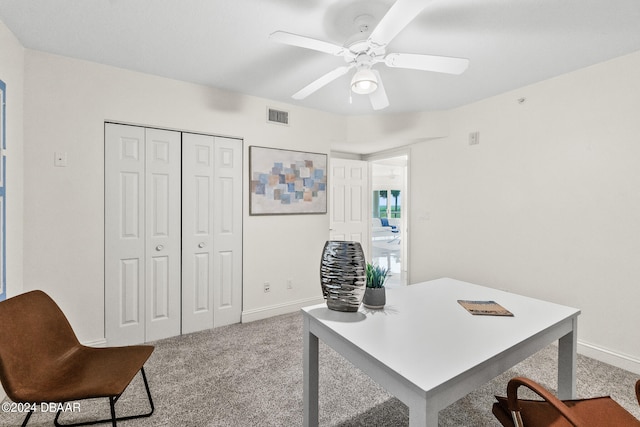 office area featuring ceiling fan and carpet floors