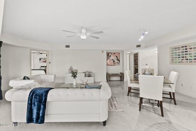 living room with ceiling fan