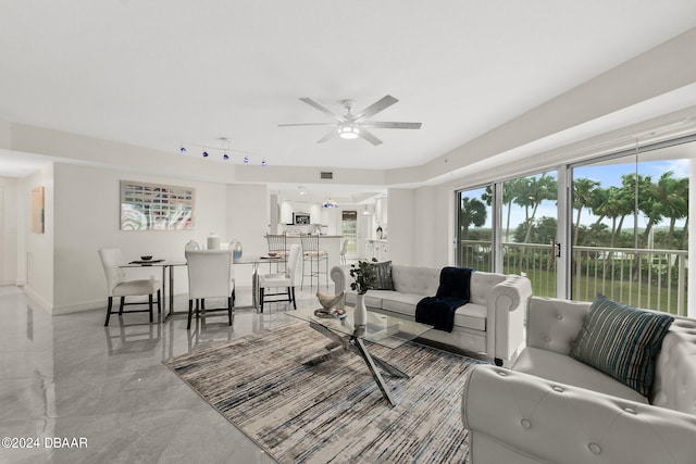 living room featuring ceiling fan