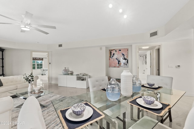 dining space with ceiling fan