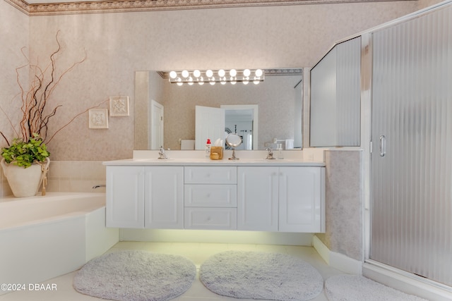 bathroom with vanity, tile patterned floors, and separate shower and tub