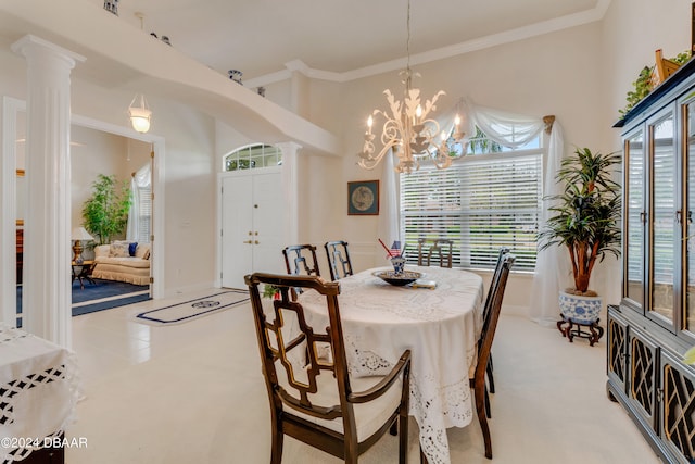 dining area featuring a wealth of natural light, light carpet, and ornate columns