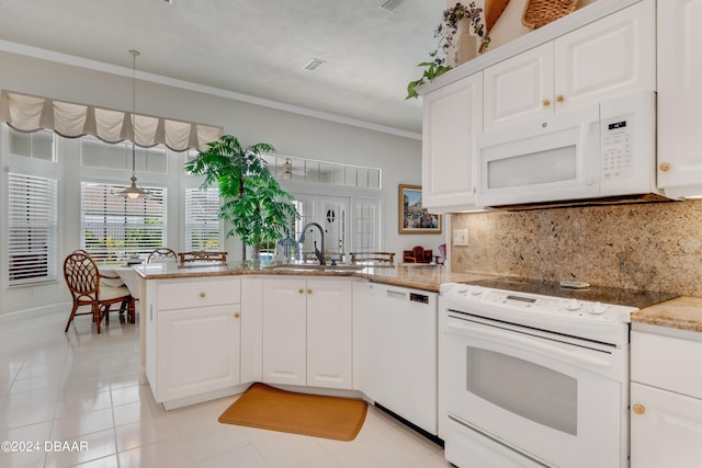 kitchen featuring white cabinetry, light tile patterned floors, and white appliances