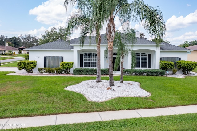 view of front of home with a front yard