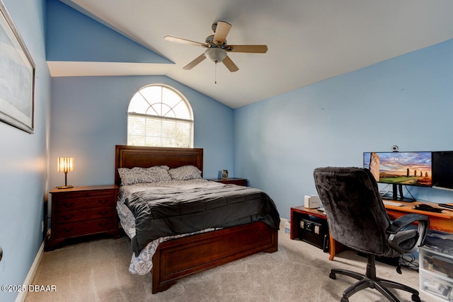 bedroom featuring lofted ceiling, ceiling fan, and light carpet