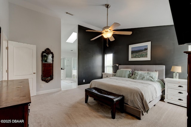 carpeted bedroom featuring ensuite bathroom, high vaulted ceiling, and ceiling fan