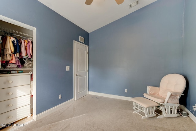 unfurnished room featuring ceiling fan, vaulted ceiling, and light carpet