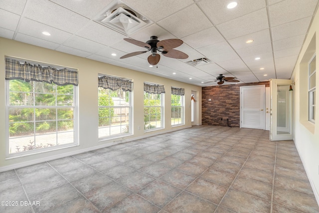 1927 Orange Tree Dr, Edgewater, FL 32141 - unfurnished sunroom with a drop ceiling, recessed lighting, tile patterned floors, and baseboards