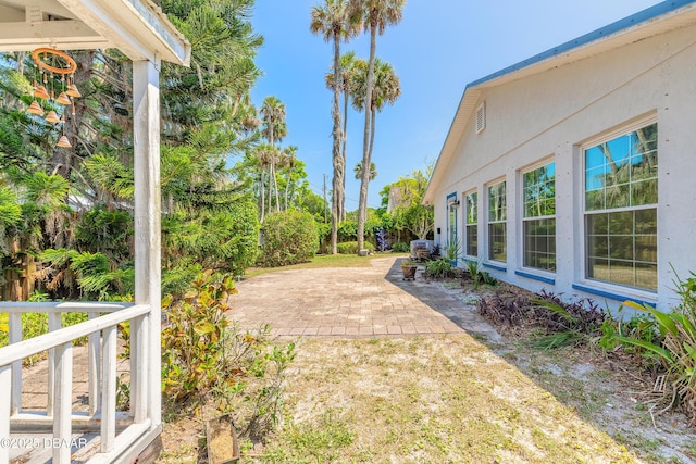 1927 Orange Tree Dr, Edgewater, FL 32141 - view of yard featuring a patio area