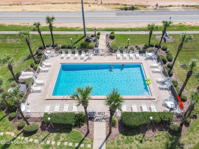 view of swimming pool with a patio