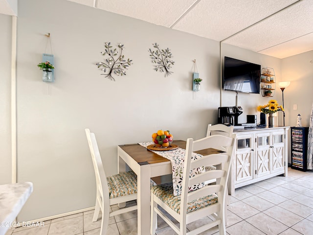 dining space with light tile patterned floors