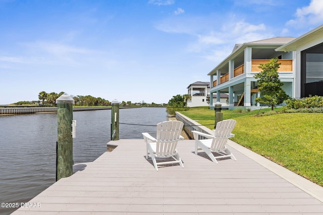 129 Seaside Pt, Flagler Beach, FL 32136 - dock with a water view and a yard